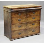 A Victorian mahogany chest, fitted with a concealed cushion frieze drawer above four further