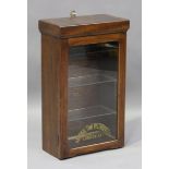 A late 19th/early 20th century teak cased display cabinet, formed from the top section of a National