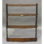 A late Victorian walnut graduating four-tier wall shelf, height 73cm, width 60cm.Buyer’s Premium