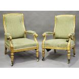 A pair of late 19th century bird's eye maple showframe armchairs with Cope's Patent brass caps and