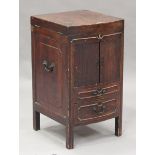 A late 18th century Anglo-Chinese elm gentleman's washstand, the hinged top enclosing a rising