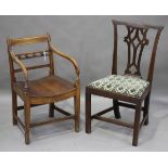 A late George III provincial fruitwood and elm seated elbow chair, height 83cm, width 52cm (