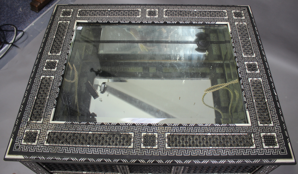 A late 19th century Middle Eastern ebonized bijouterie table, inset with overall panels of finely - Image 10 of 10