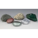 A large collection of mineral and geological specimens, including desert rose, lapis lazuli,