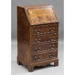 A late 20th century George III style burr walnut bureau of small proportions, height 98cm, width