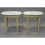 A pair of late 20th century Louis XVI style cream painted oval occasional tables, the white marble