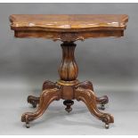 A mid-Victorian burr walnut fold-over card table, on a reeded baluster stem and four cabriole