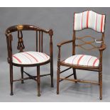 An Edwardian mahogany framed and boxwood inlaid elbow chair, upholstered in contemporary striped