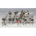 A set of nine 20th century cold painted cast bronze band members, each amusingly modelled as a