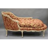 A 20th century Rococo style limed beech showframe daybed, upholstered in a red and golden yellow