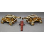 A pair of modern ornamental bronze model ships' Blomfield pattern cannon, barrel length 50cm,