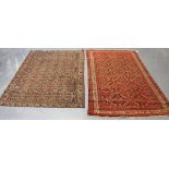 A Feraghan rug, North-west Persia, early 20th century, the charcoal field with overall dense herati,