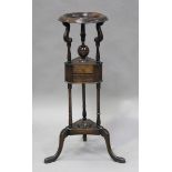 An early 20th century George III style mahogany gentleman's washstand, raised on tripod cabriole