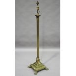 An Edwardian brass Corinthian column telescopic lamp standard, raised on a stepped square base and