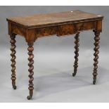 A late Victorian burr walnut centre table, the later top above a panelled frieze, on barley twist