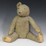 A late 20th century painted earthenware model of a teddy bear, height 33.5cm.Buyer’s Premium 29.