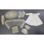 A selection of mainly 19th century lacework items, including two bonnets, collars, headpieces and