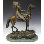 After Carl Kauba - Indian Chief on Horseback, a 20th century brown patinated cast bronze