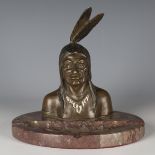 A 20th century Austrian brown patinated cast bronze table lighter in the form of the head and