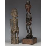 A small African Luba tribe carved wooden figure of a standing pregnant tribeswoman, Democratic