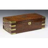 A William IV mahogany and brass bound campaign writing slope, the sides with recessed handles,