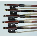 A group of five cello bows, together with a cello scroll and neck section.Buyer’s Premium 29.4% (