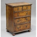 An early 20th century George I style walnut chest of two short and three long drawers with