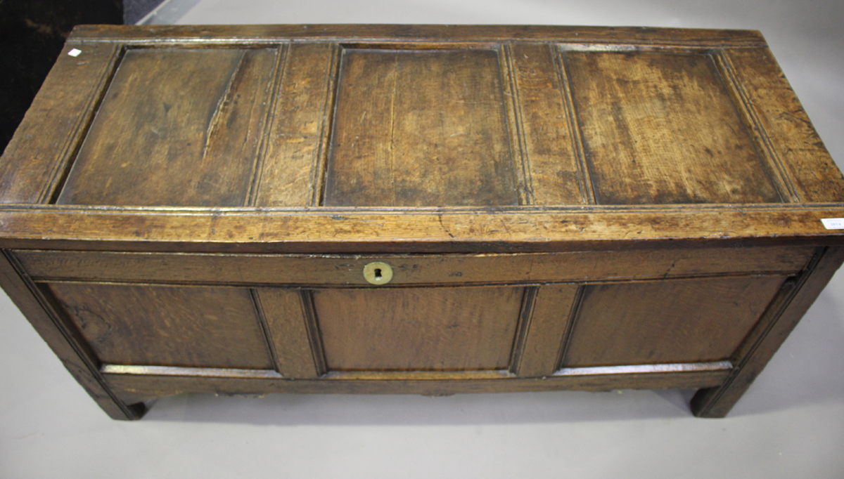 An early 18th century panelled oak coffer with channel moulded decoration, height 68cm, width 141cm, - Image 4 of 4