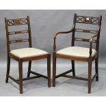 A set of eight early 20th century mahogany and satinwood crossbanded dining chairs with cream
