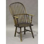 A 19th century ash and elm Windsor armchair with spindle and hoop back, height 101cm, width 57cm (