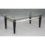 A modern brown patinated and gilt brass coffee table, the bevelled glass top on square tapering legs