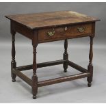 An 18th century provincial oak and elm side table, fitted with a single frieze drawer, height