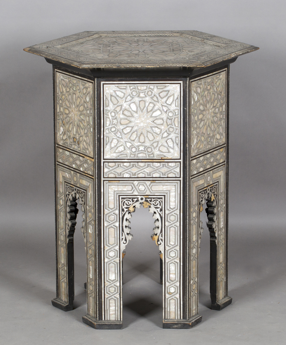 An early 20th century Middle Eastern hardwood and mother-of-pearl hexagonal occasional table,