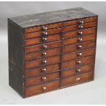 A 19th century stained pine collector's chest of eighteen drawers, height 55cm, width 63cm, depth