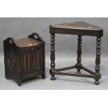 A mid-20th century Jacobean Revival oak coal purdonium, height 57cm, width 38cm, together with an