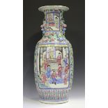 A Chinese Canton famille rose porcelain vase, mid-19th century, the shouldered tapering body and