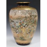 A Japanese Satsuma earthenware vase by Keizan, Meiji period, of stout ovoid form, painted with