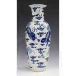 A Chinese blue and white porcelain vase, mark of Kangxi but late 19th century, the shouldered