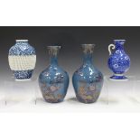 Two Japanese Koransha porcelain vases, Meiji period, each ovoid body and trumpet neck painted in
