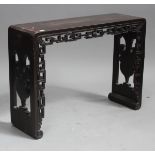 A Chinese hardwood altar table, possibly zitan, late Qing dynasty, the rectangular top above a