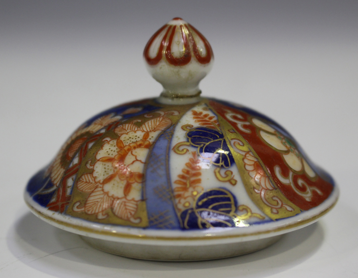 A Japanese Fukagawa Imari porcelain vase and cover, Meiji period, painted with panels of flowers, - Image 2 of 9