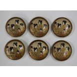 A set of six Japanese Satsuma earthenware circular buttons, Meiji period, each painted and gilt with