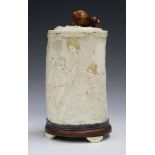 A Japanese carved ivory tusk jar and cover, Meiji period, carved in low relief with a continuous