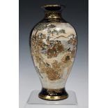 A Japanese Satsuma earthenware vase by Hattori, Meiji period, of baluster form, the body painted and