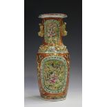 A Chinese Canton famille rose porcelain vase, mid-19th century, painted with gilt ground panels of