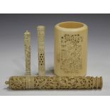 A Chinese Canton export ivory cylindrical needle case and cover, mid to late 19th century, carved in