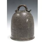 A Chinese brown patinated bronze temple bell, 19th/20th century, cast in relief with scrolls and