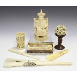 A small group of Chinese Canton ivory, mid-19th century or later, comprising a figure of a seated