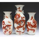 A Chinese iron red decorated porcelain vase, 20th century, of baluster form, painted with a