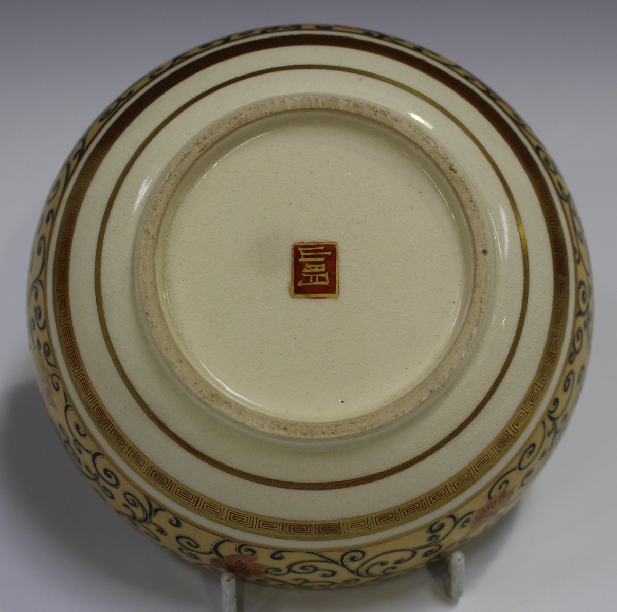 A Japanese Satsuma earthenware circular bowl with scalloped rim, Meiji period, painted to the - Image 4 of 8